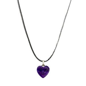 This is a deep purple Amethyst Crystal Heart on a black leather rope chain